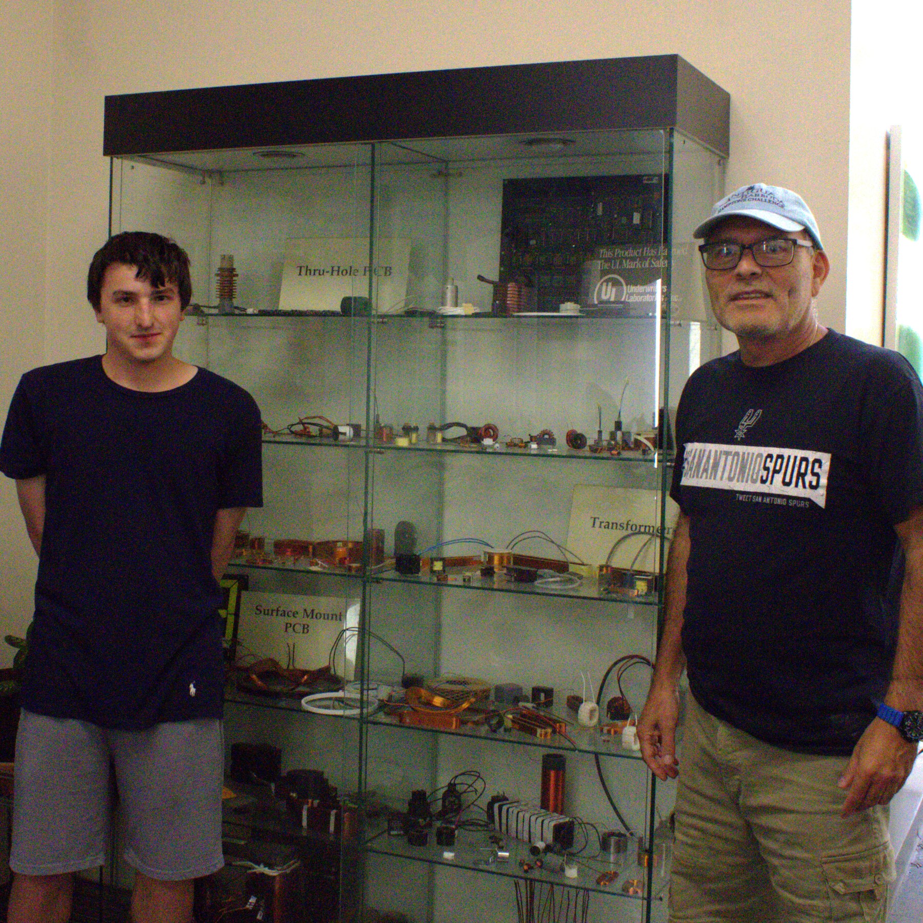 Sag Harbor Industries team members beside a product display